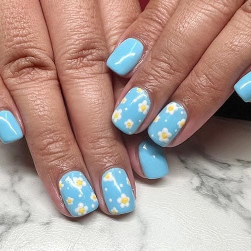 classic-manicure-nail-salon-pukekohe-franklin-blue-daisy-nail-art